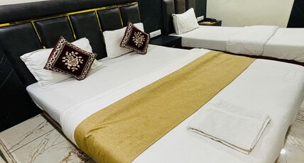 Hotel Heritage Gurukul Road Room Type - Three Bed Ac