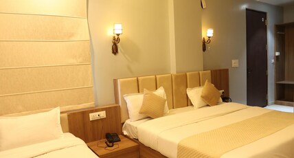 HOTEL TRINAY Room Type - Super Deluxe Room