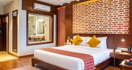 Regenta Resort & Spa By Riverside Room Type - PREMIUM RIVER VIEW WITH BALCONY Regenta Resort & Spa By Riverside Room Type - PREMIUM RIVER VIEW WITH BALCONY