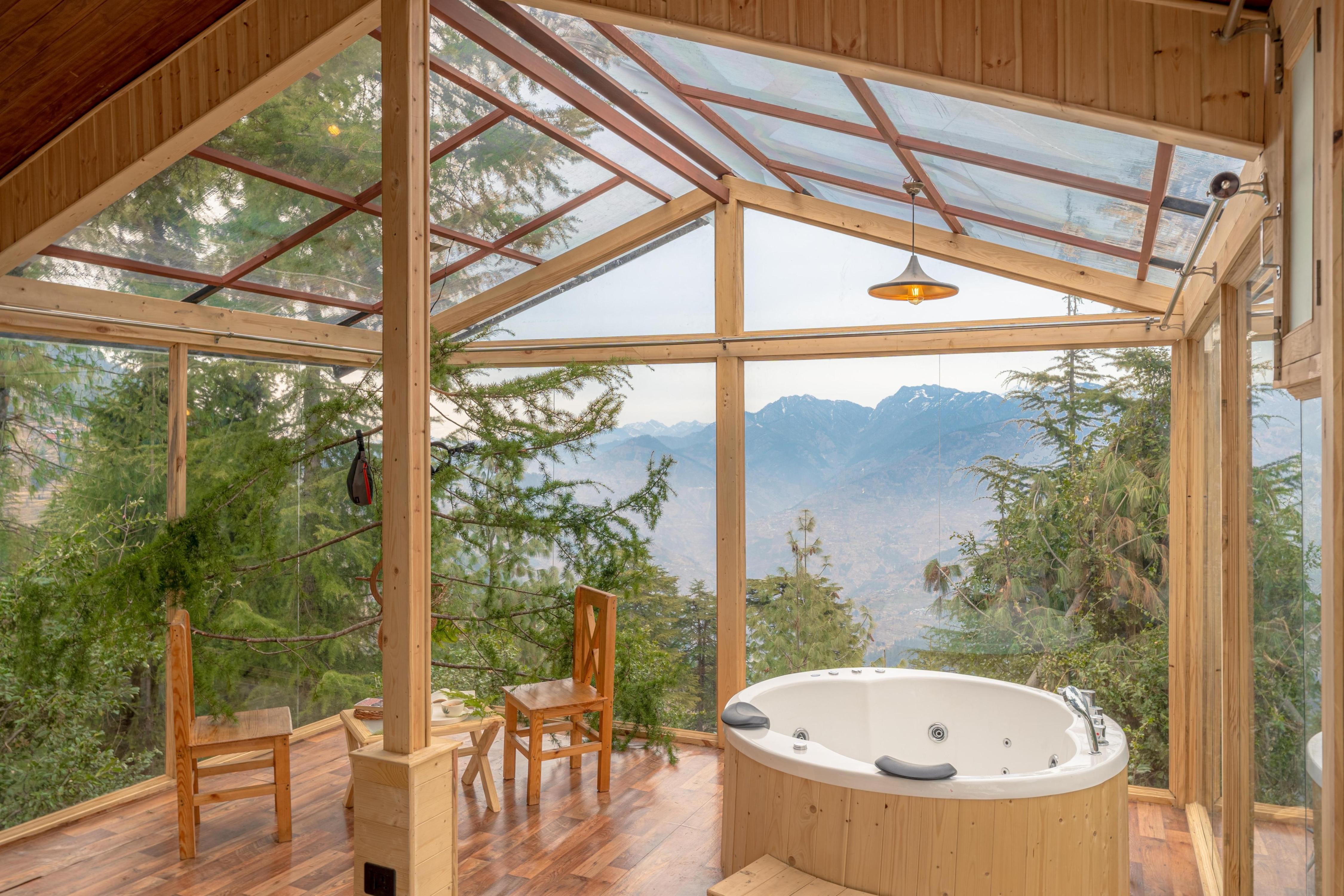 Glass House With A Hot tub