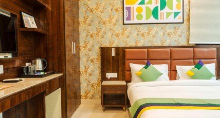 Treebo Sunny Feast Room Type - Deluxe Room