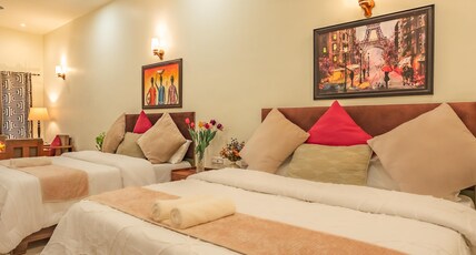 Pristine woods | Luxe Stay | Pool Room Type - Deluxe Double Bedroom