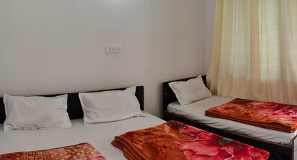 The Omkareshwar Inn, Kedarnath Room Type - Deluxe Triple Bedroom