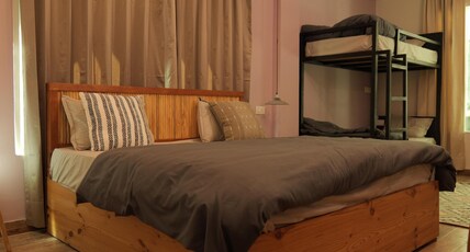 The Trippy Tribe Riverside Room Type - Quadruple Room with common Balcony