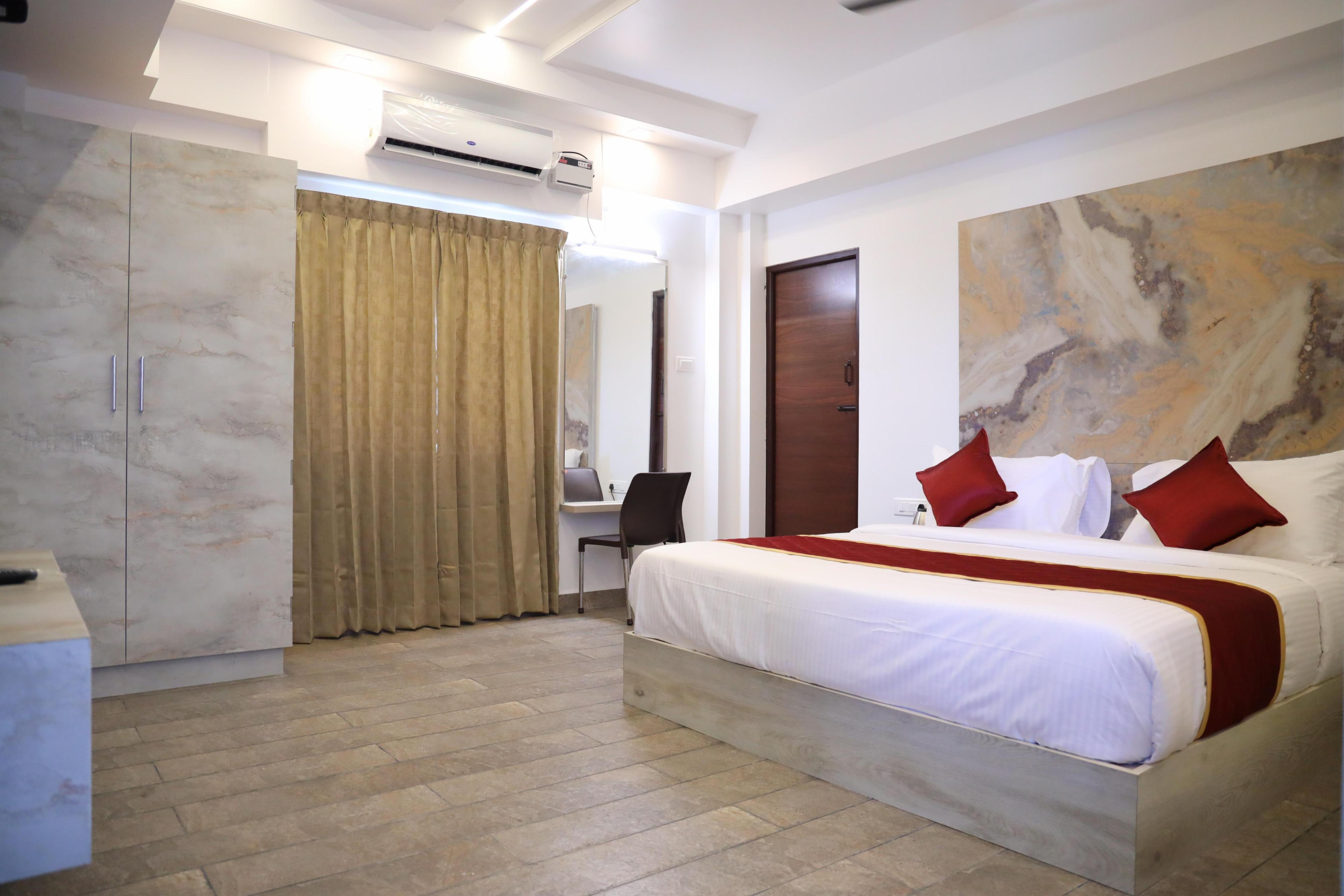 DHIVYA RESIDENCY Room Type - Deluxe King Bed DHIVYA RESIDENCY Room Type - Deluxe King Bed
