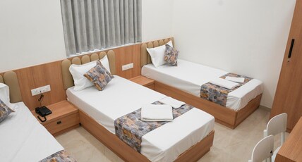 MARUTI GRAND HOTEL Room Type - Triple Bed Deluxe Air Conditioned Room MARUTI GRAND HOTEL Room Type - Triple Bed Deluxe Air Conditioned Room