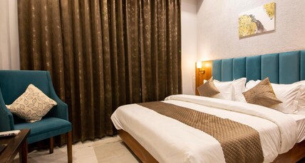 Perfectstayz Premium Laxmi Heritage Room Type - Deluxe room