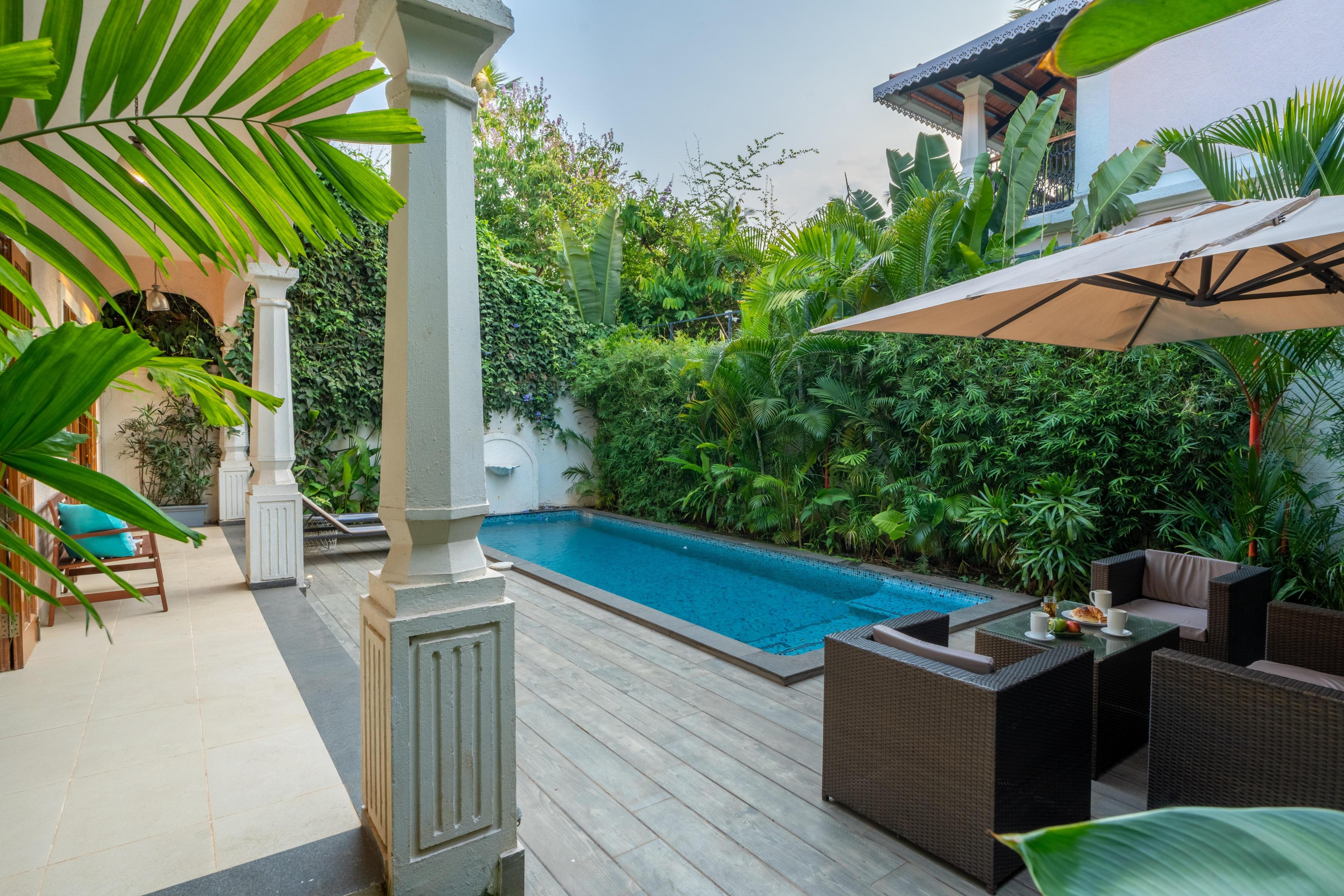 ELIVAAS Signature 4 BHK with Pvt Pool in Arpora | Lumin - Tap to explore photos