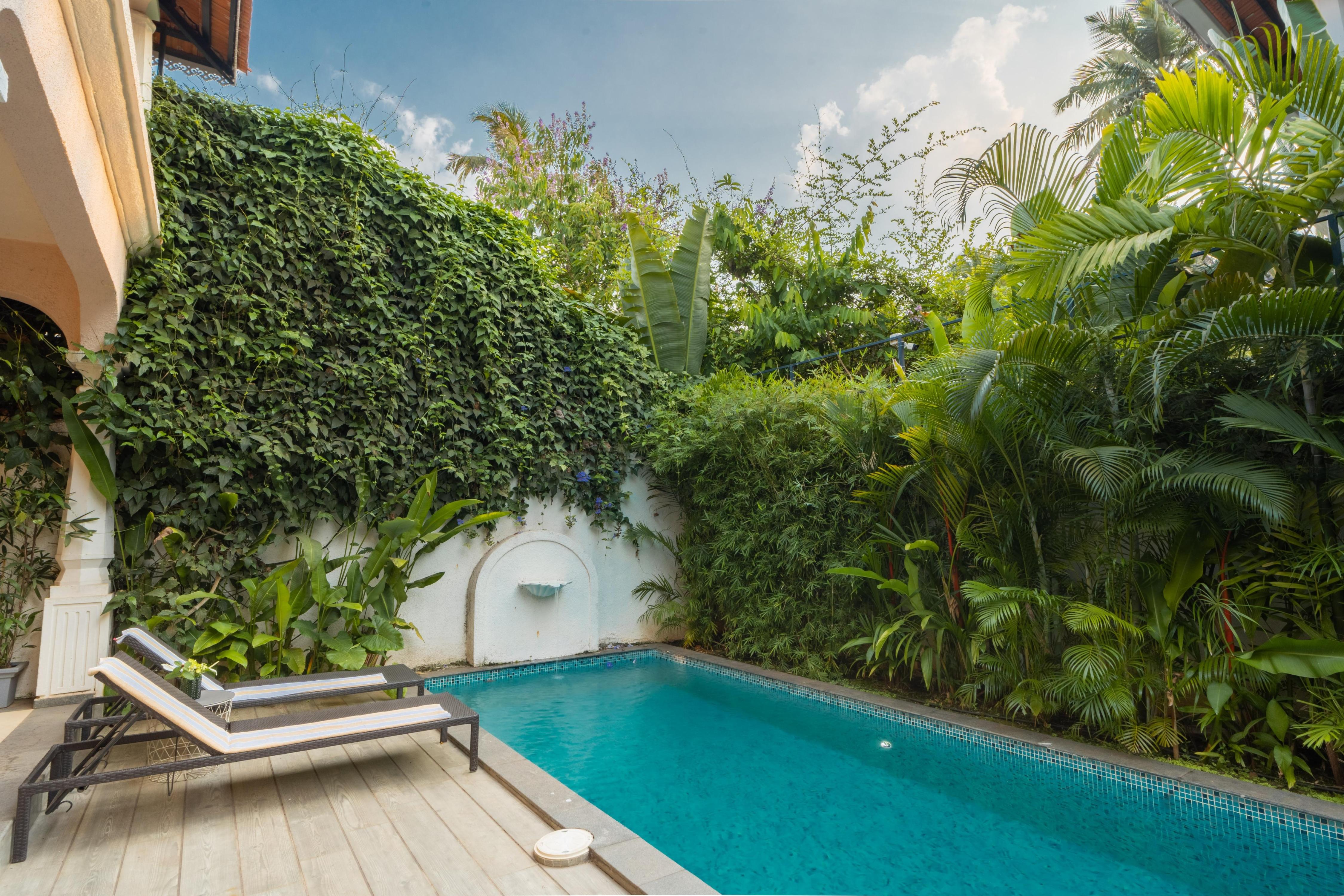 ELIVAAS Signature 4 BHK with Pvt Pool in Arpora | Lumin - Tap to explore photos
