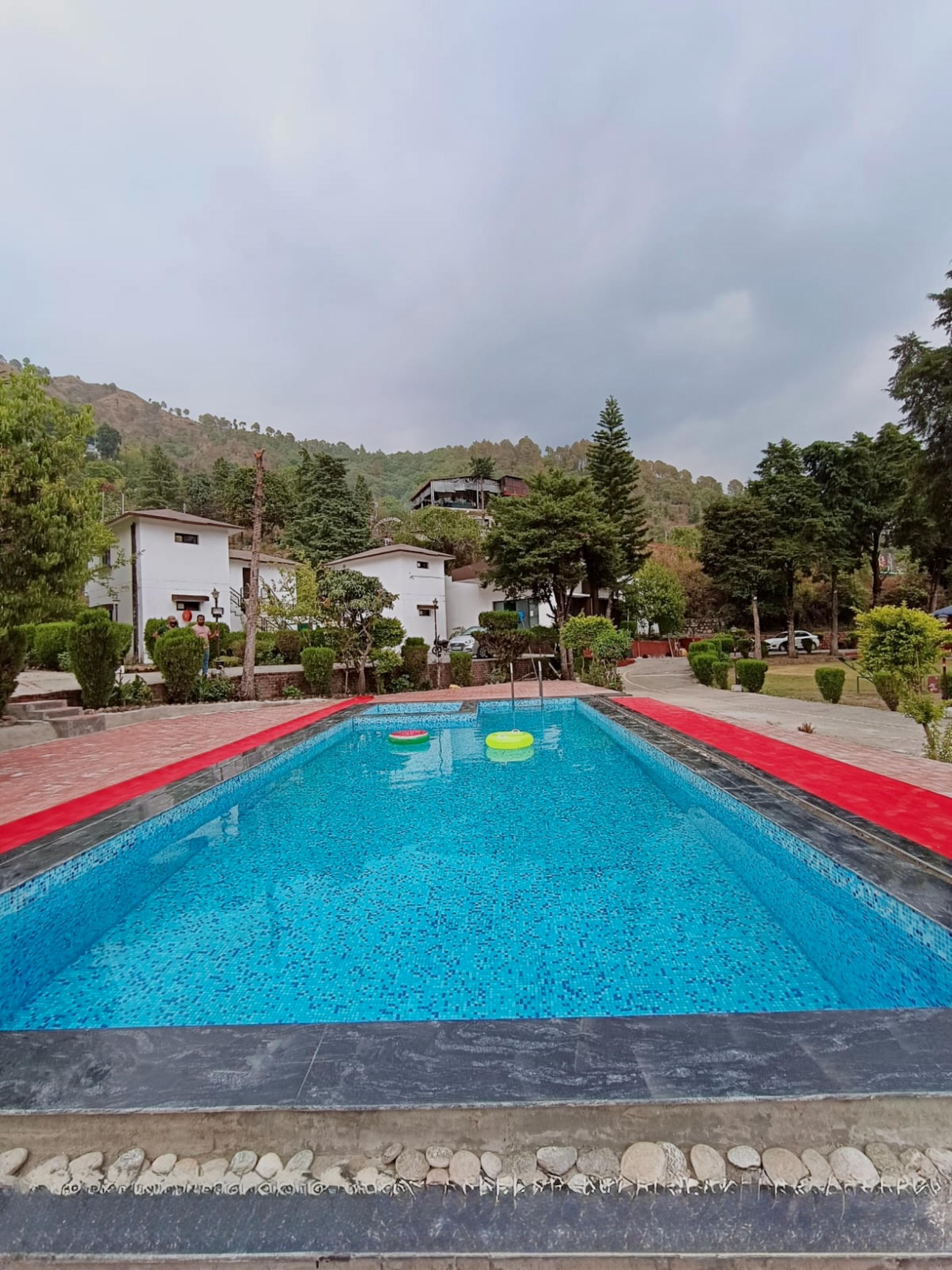 Shikha Resort by Ewentbliz - Tap to explore photos