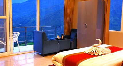 Hotel R. Narayan Pleasant Inn Room Type - Super Deluxe Rooms WIth Balcony Hotel R. Narayan Pleasant Inn Room Type - Super Deluxe Rooms WIth Balcony