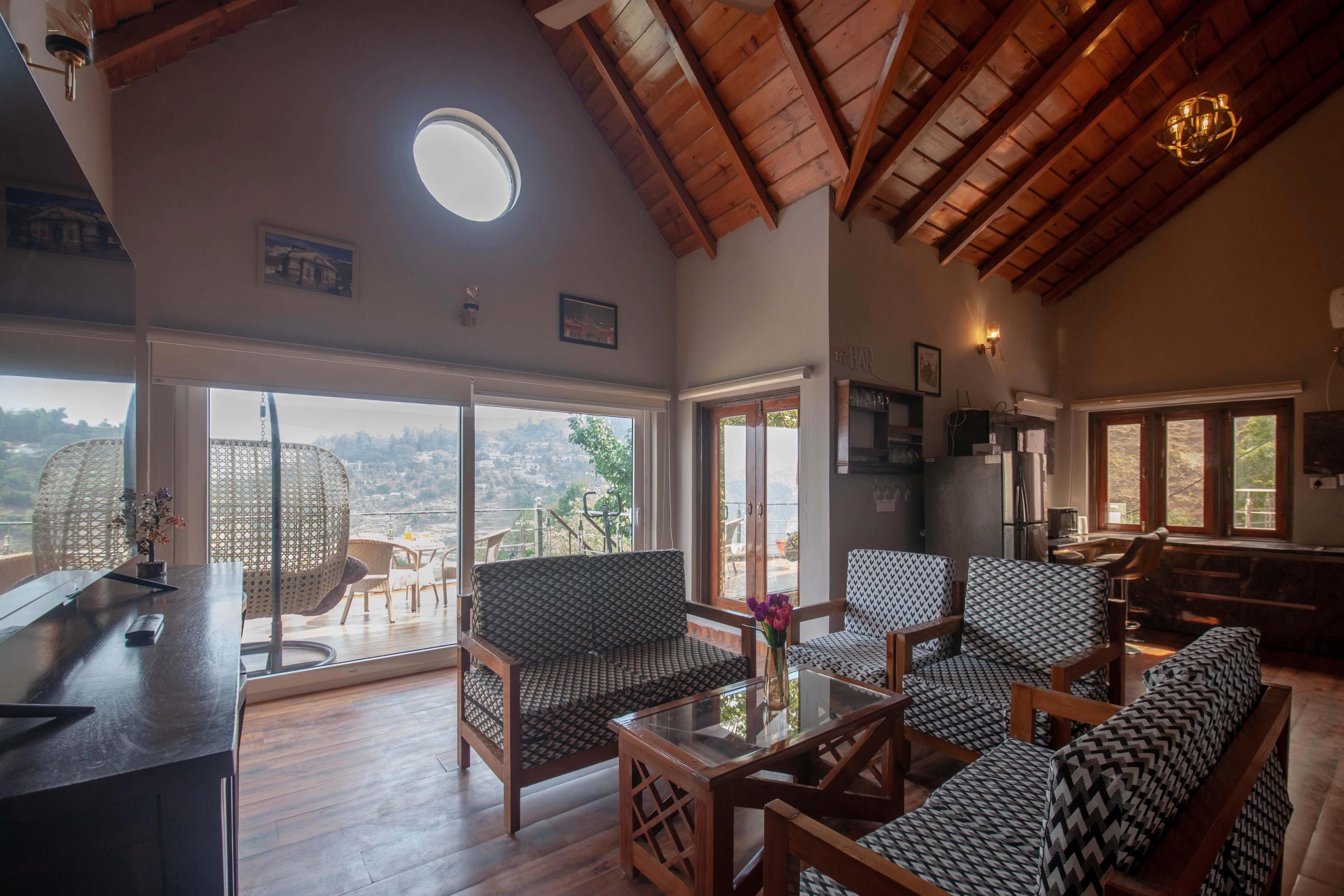Alaya Stays Stunning 4BHK with Mountain View | Amara Dawn - Tap to explore photos