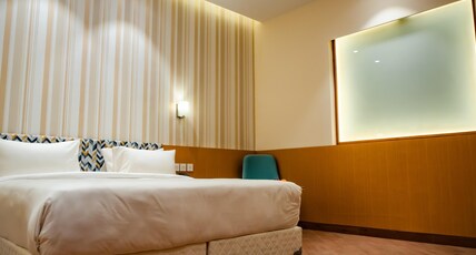 Ramada Encore by Wyndham, Lucknow Airport Room Type - Mobility Accessible Room Bathtub w Grab Bars Ramada Encore by Wyndham, Lucknow Airport Room Type - Mobility Accessible Room Bathtub w Grab Bars