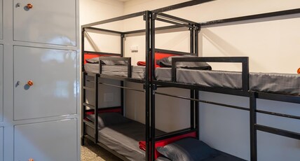 Trippr Mysuru Room Type - 8 Bed Dorm 1 AC Age limit - 18 to 35