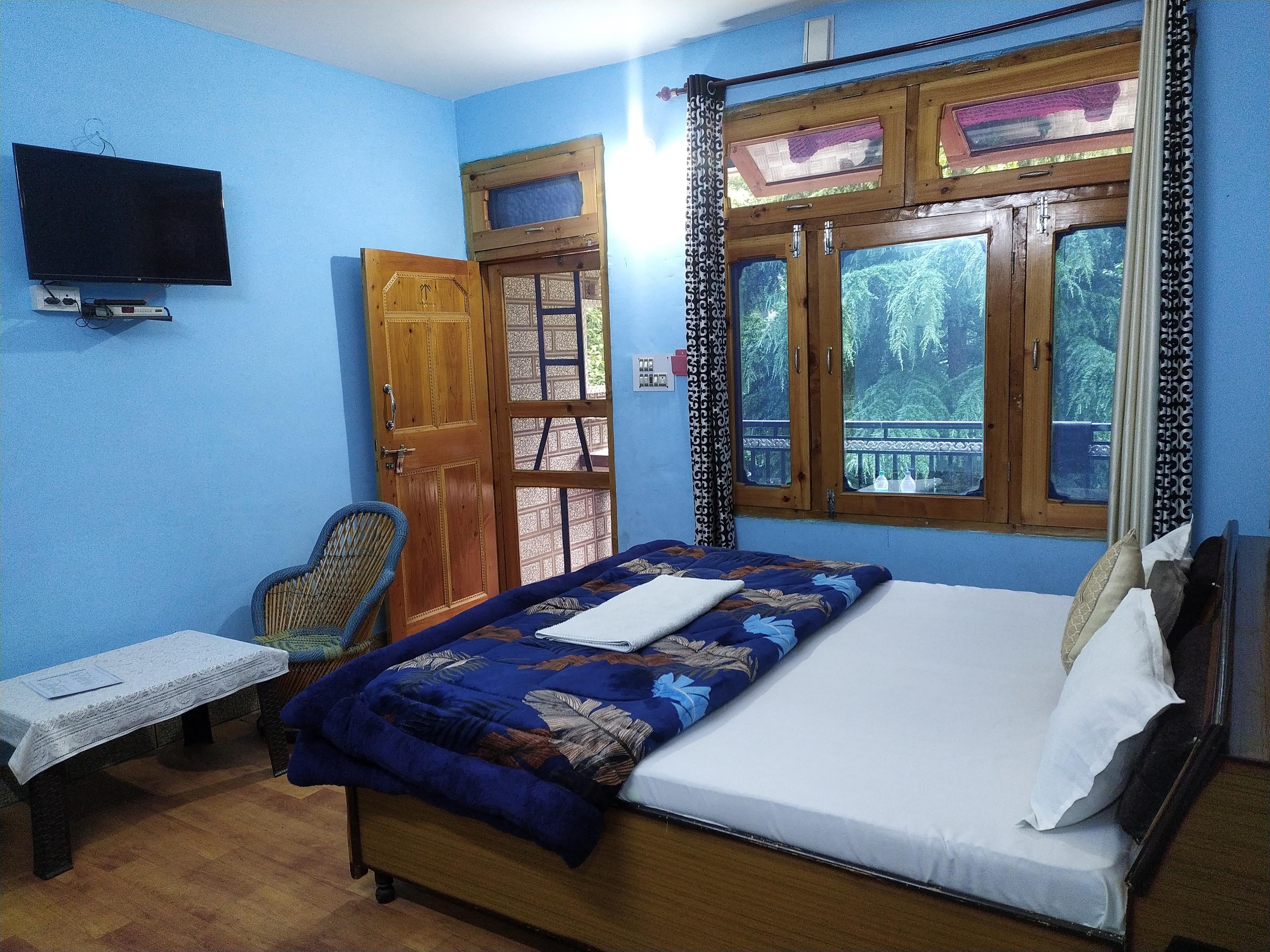 Tirthan river front farm stay. - Tap to explore photos