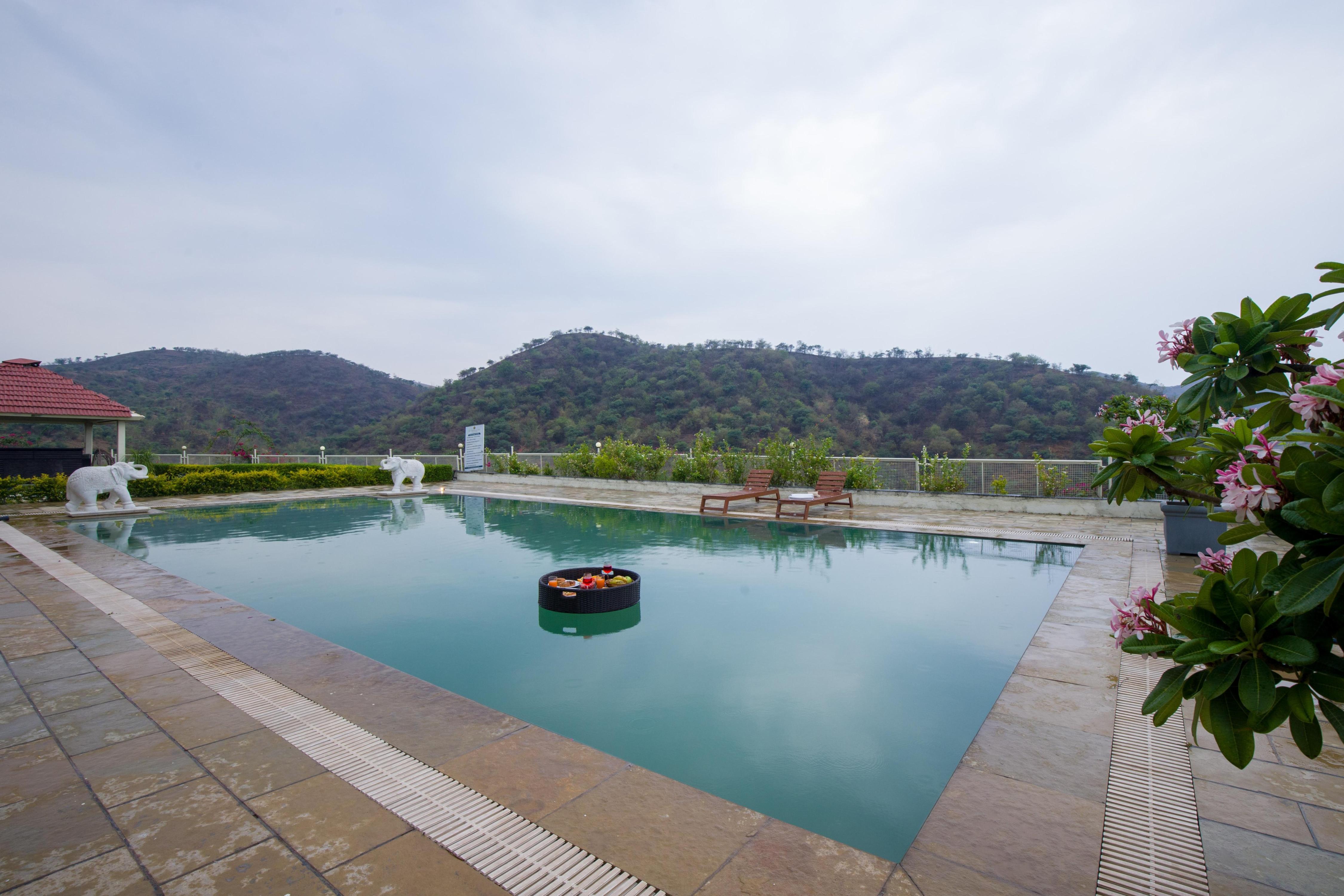 ELIVAAS Signature Shourya Celesta 3 BHK with Pvt Pool - Tap to explore photos