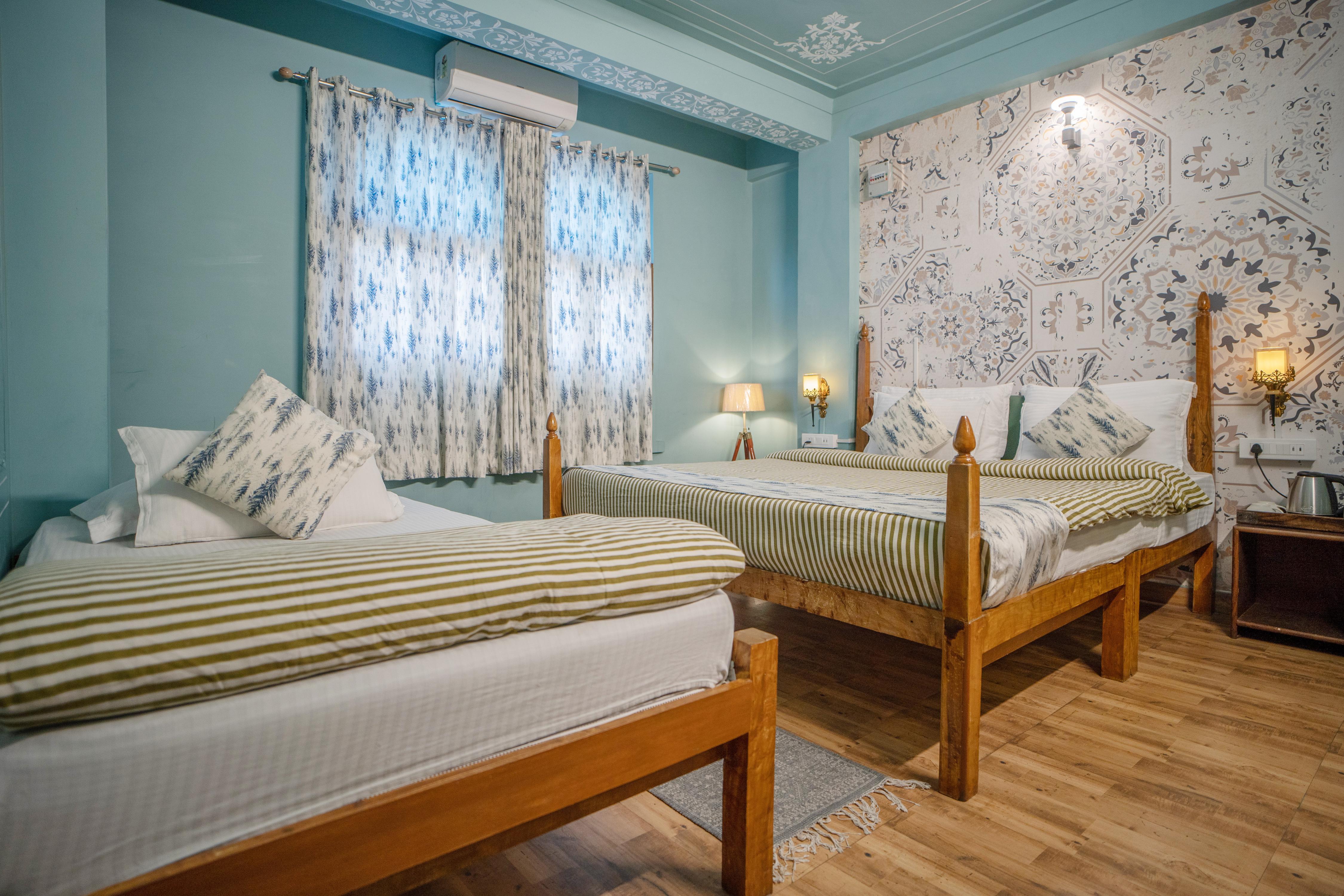 Footprint Hostel | 50 Metres from City Palace Room Type - Deluxe Quadraple Room