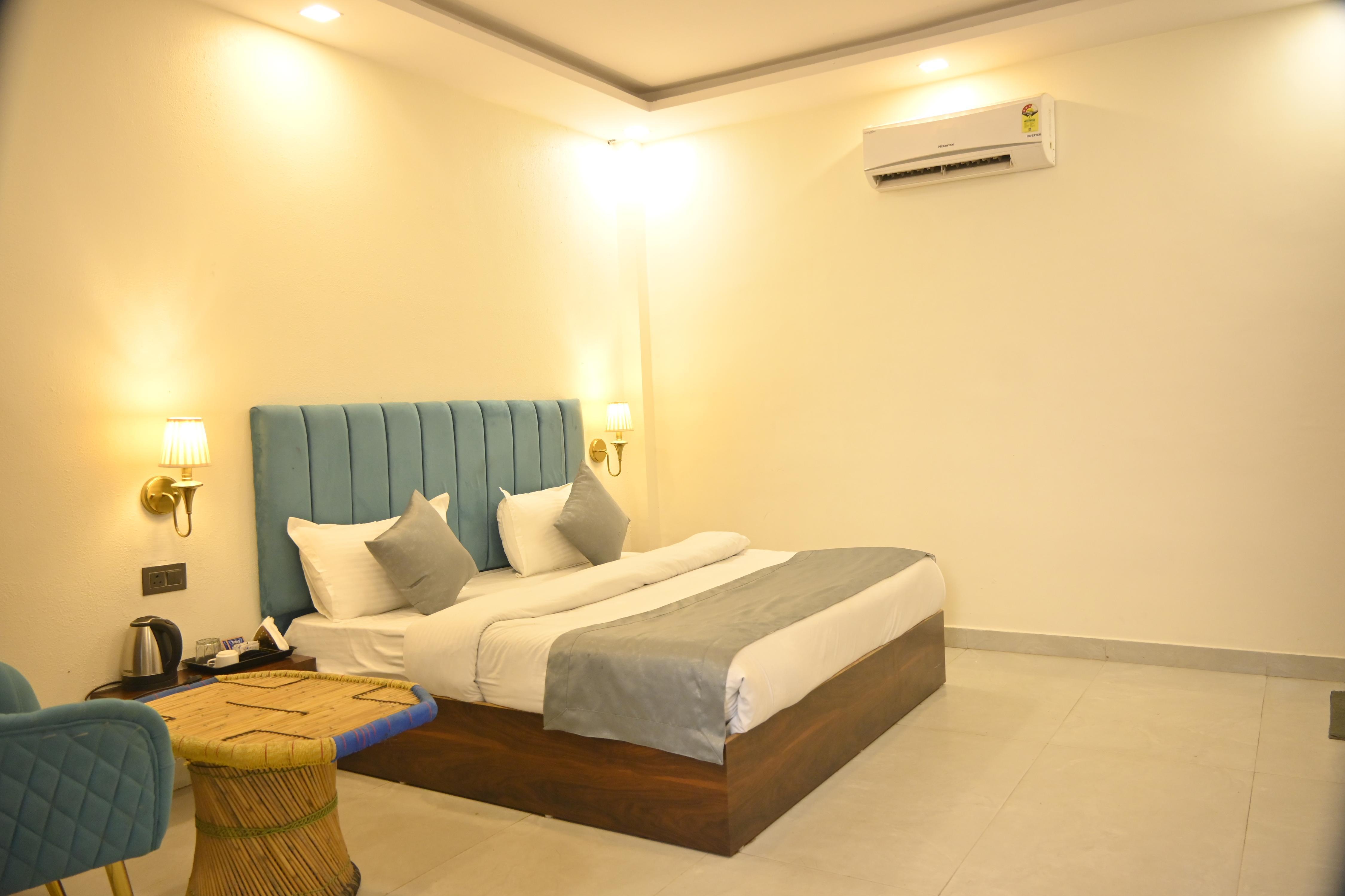 Gulmohar green lawn Room Type - Super Deluxe
