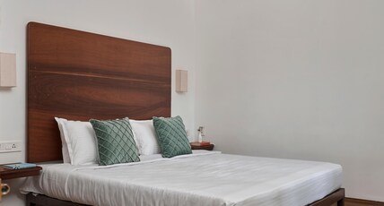 Curly wood by clustercloud Room Type - Deluxe Balcony View AC Room