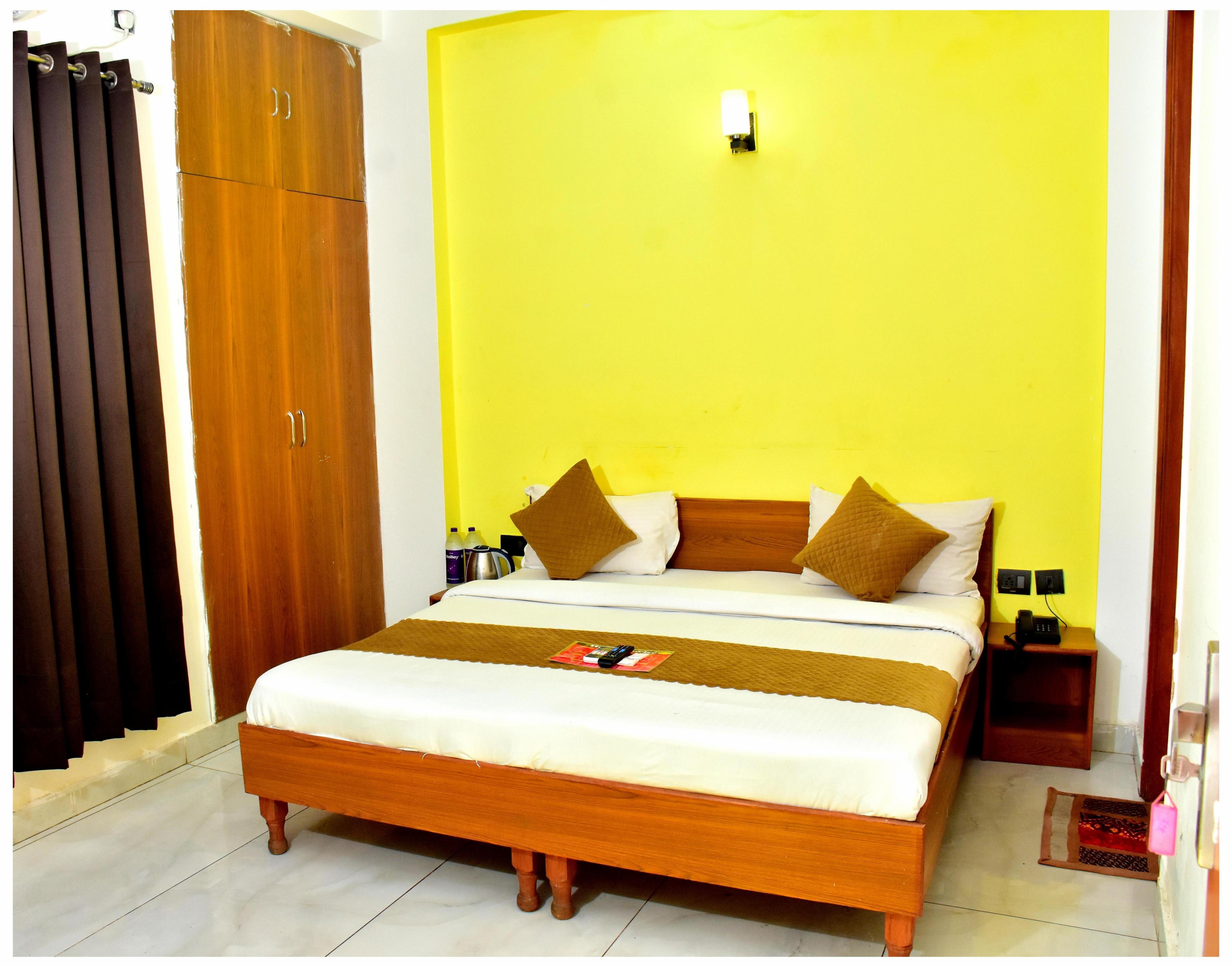 Hotel Divine Stay - Tap to explore photos