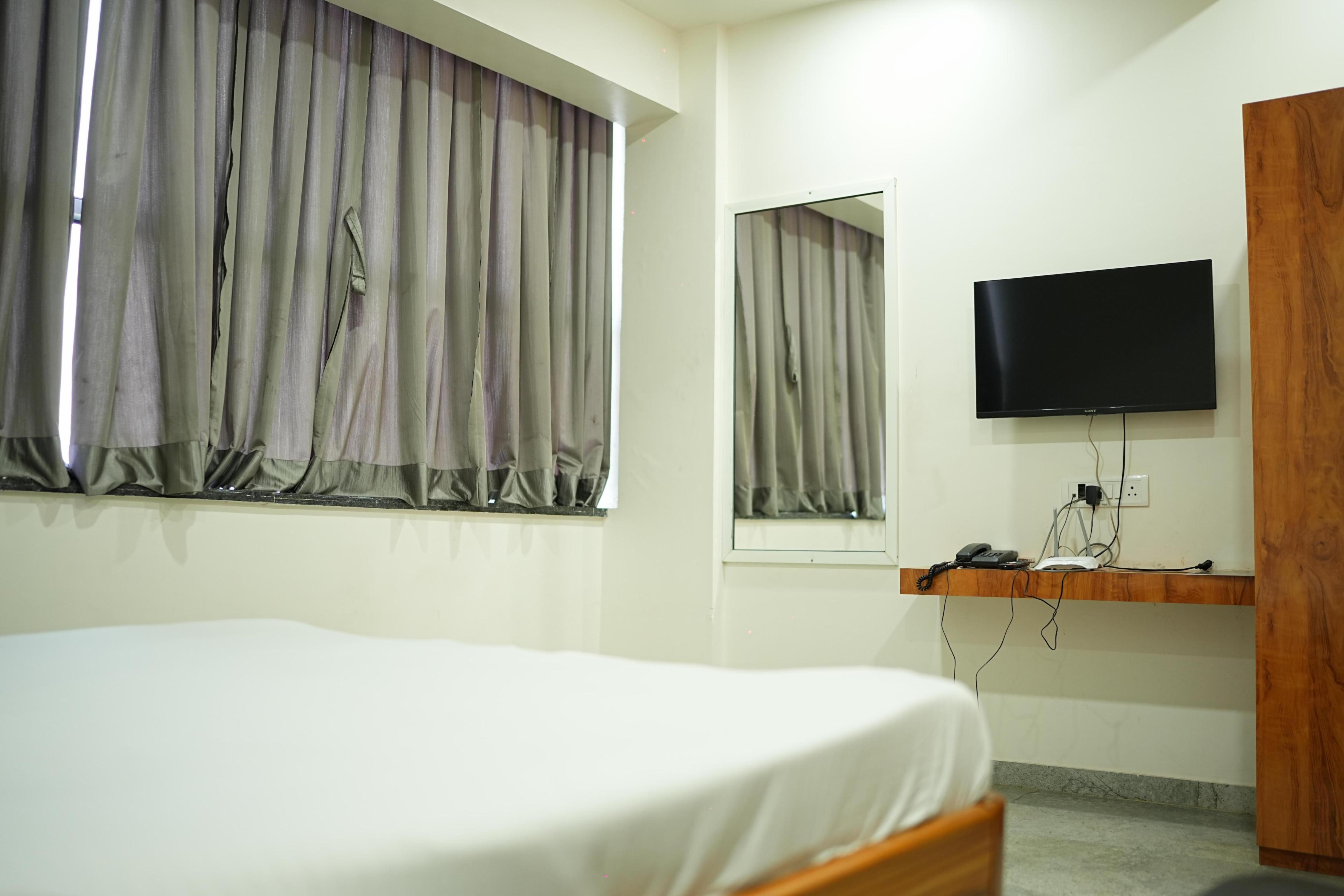 Hotel New Vaishnavi - Tap to explore photos