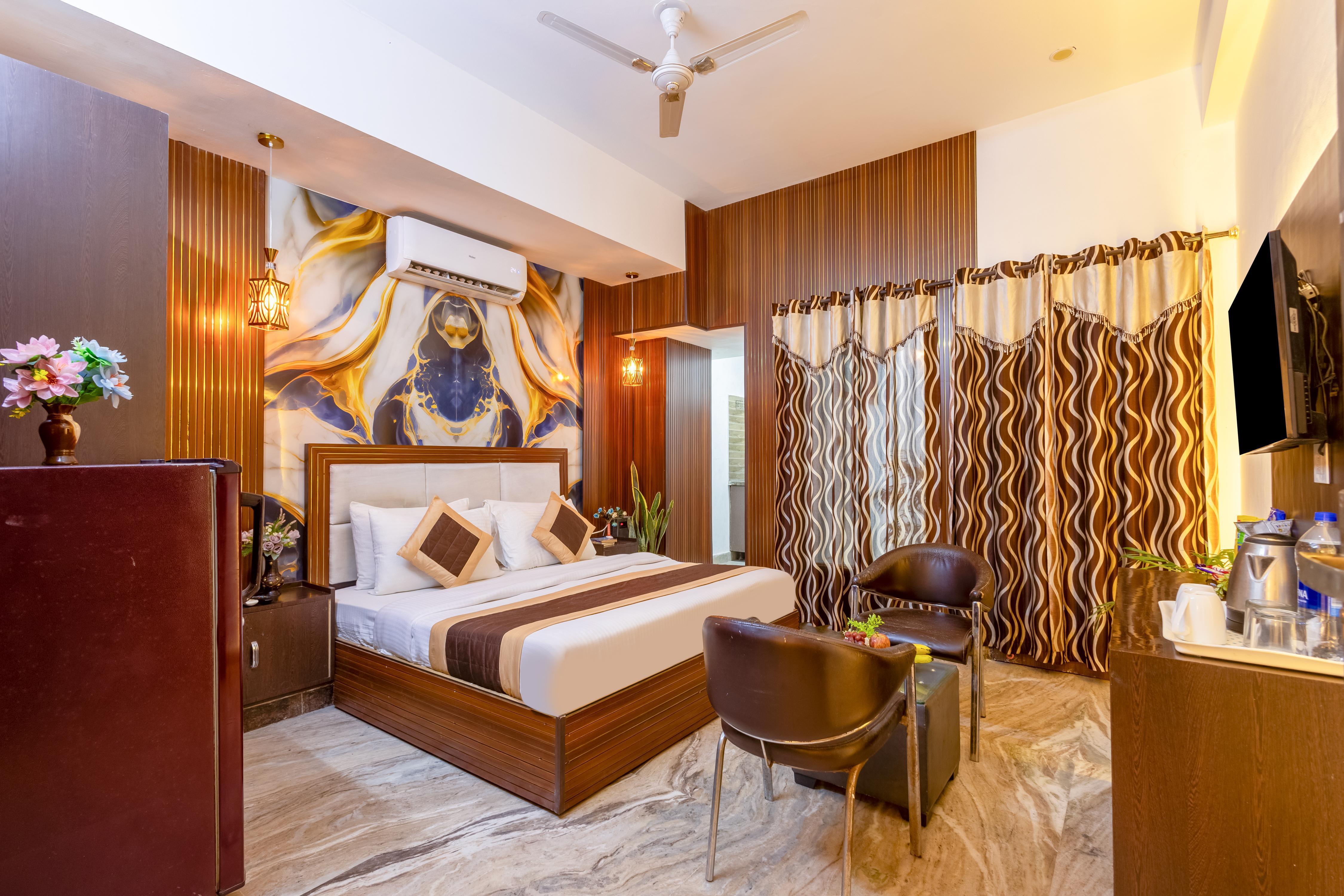 Hotel Ashiyana Elite near by golf course road Room Type - Deluxe room With Balcony