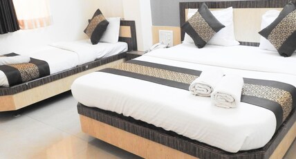 Hotel Sai Vishwkarma Room Type - Triple Bed Room. A.C.