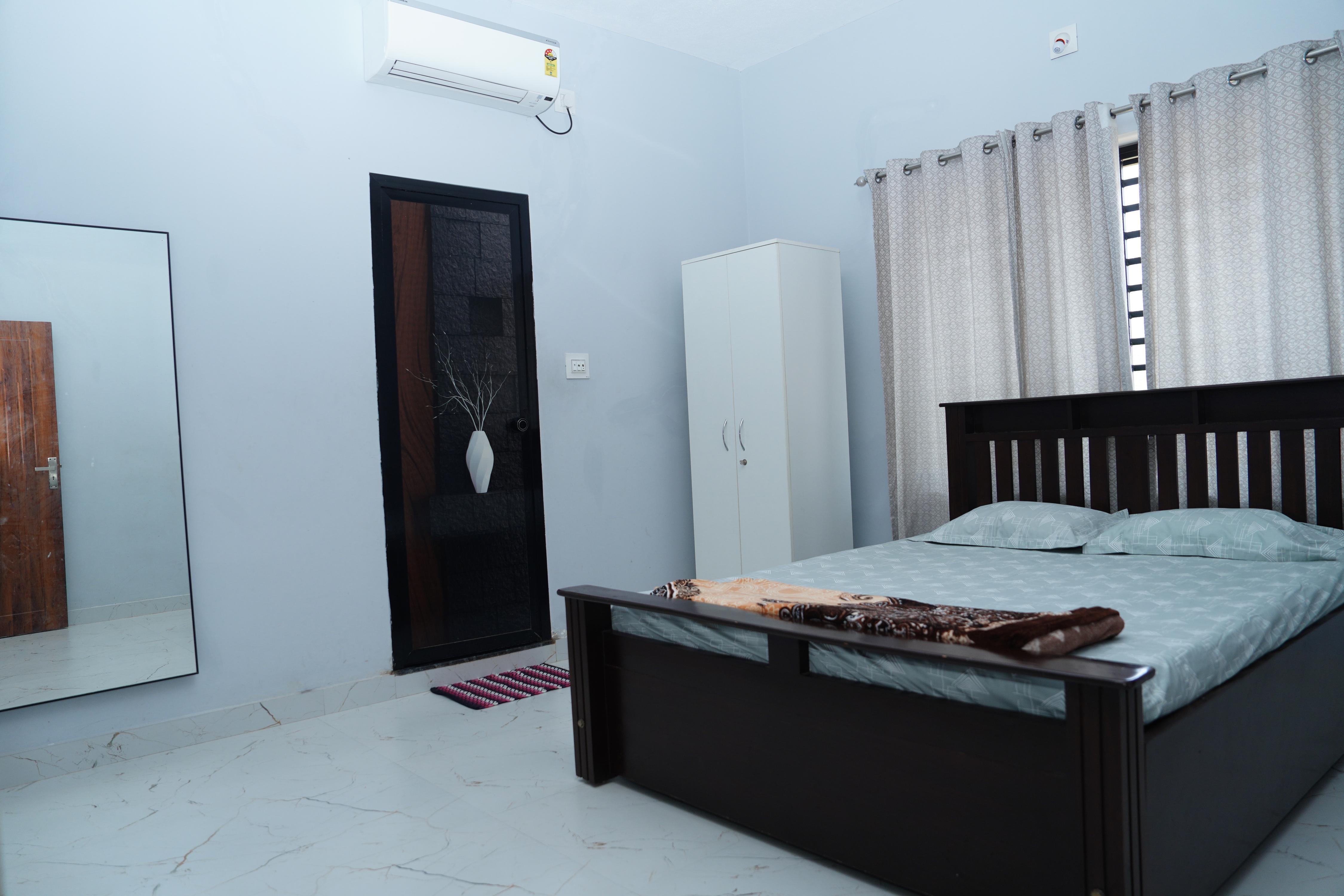 Sukruthi service apartment - Tap to explore photos