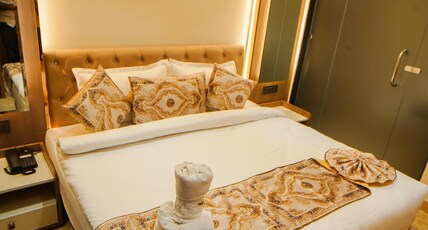 Hotel Ammison Inn & Suites Room Type - Deluxe Room