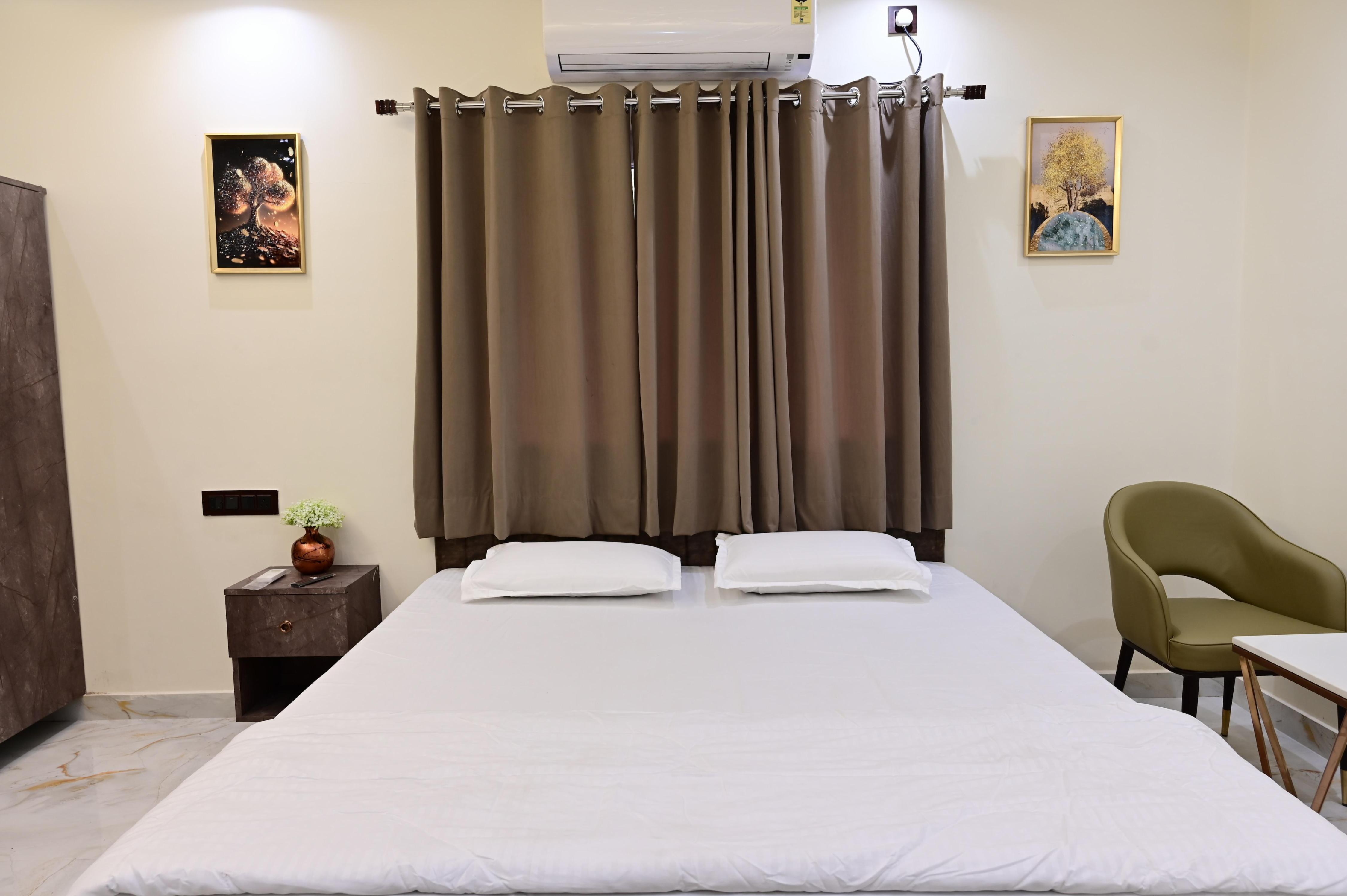 Royal Galaxy Homes Room Type - AC Deluxe Room
