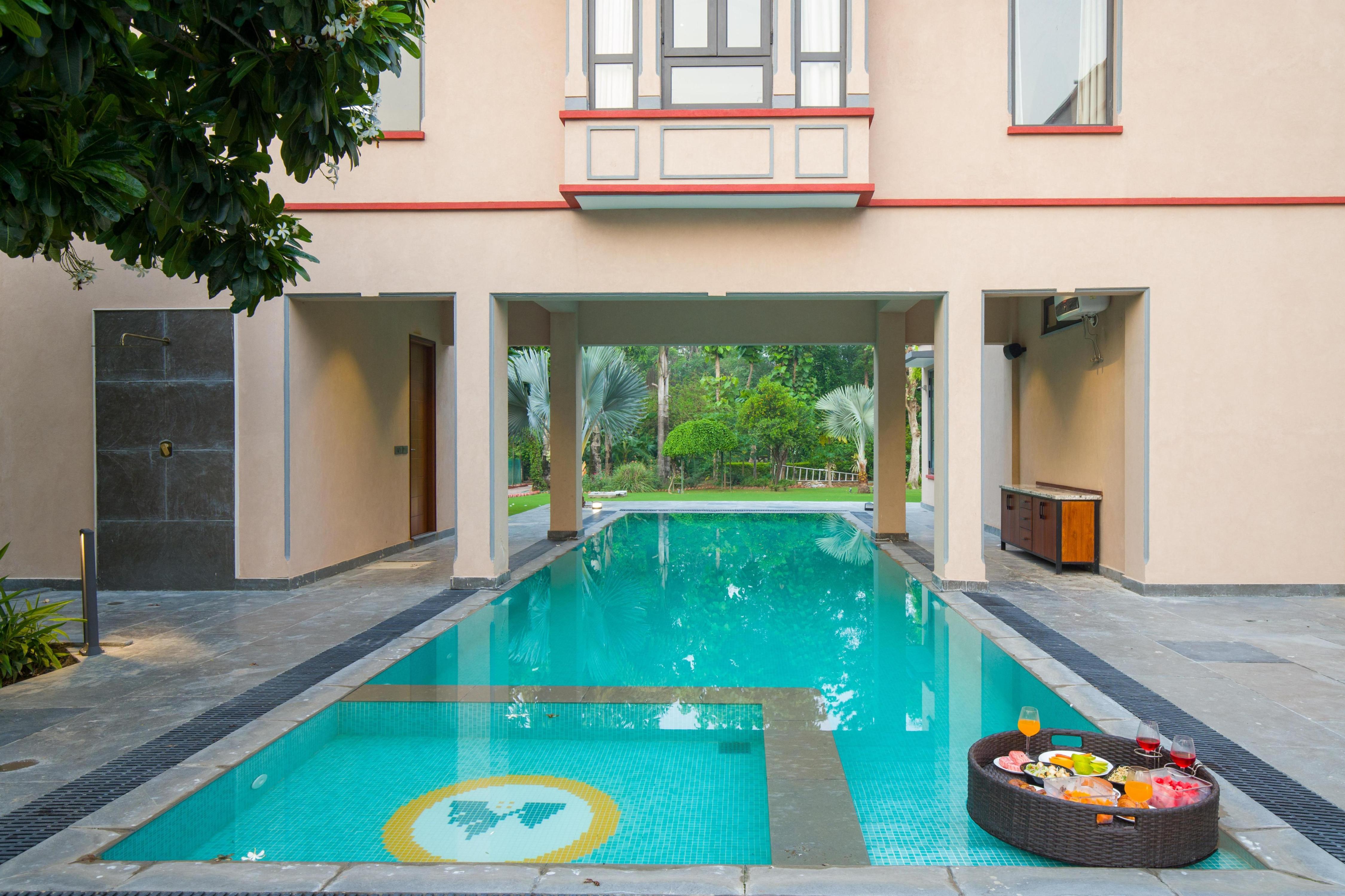 ELIVAAS 5 BHK With Entertainment Lounge & pvt pool | Taus Bagh - Tap to explore photos