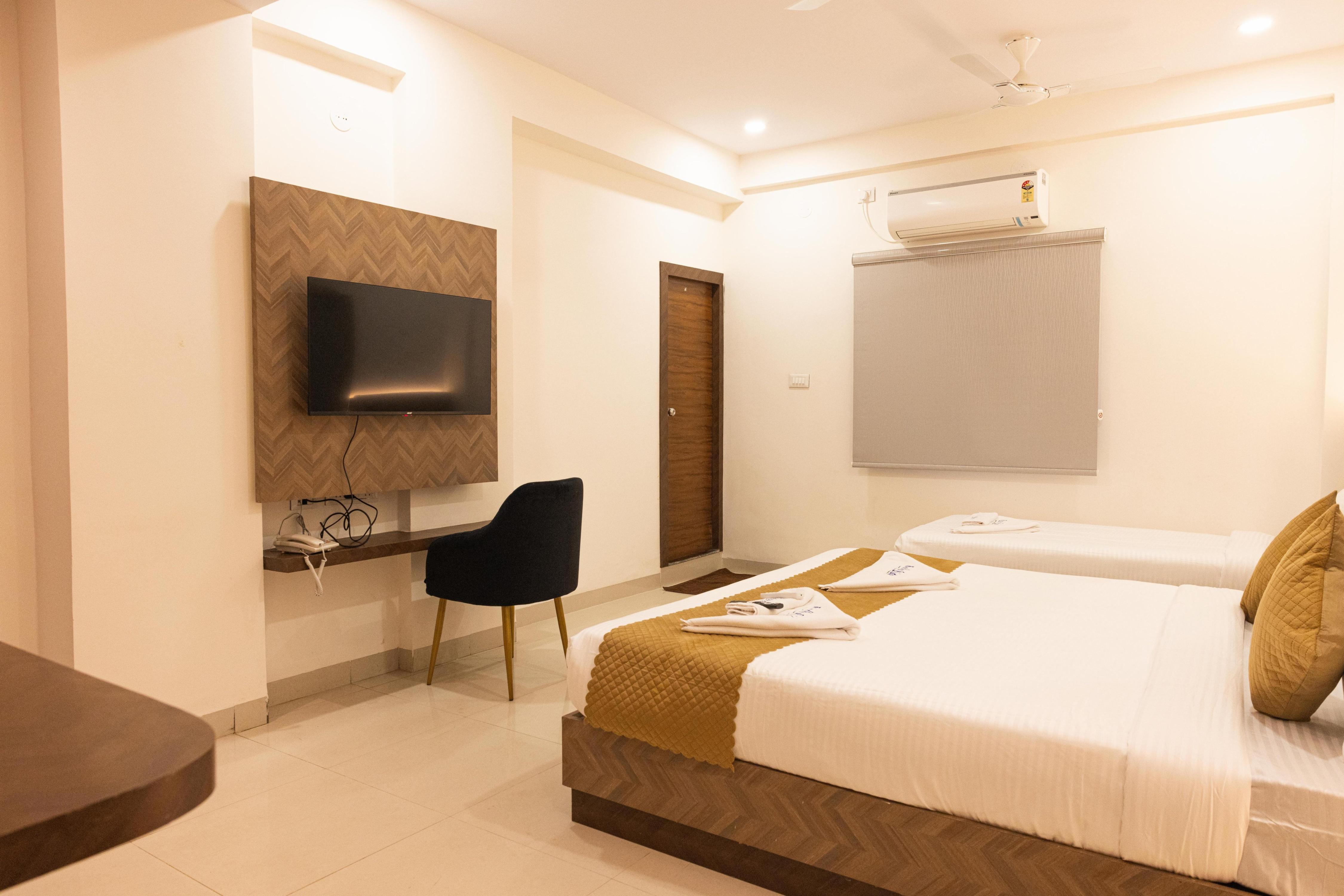 Hotel Radhe Pride Hitech City - Tap to explore photos