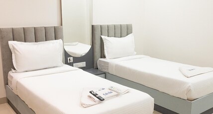 Hotel Radhe Pride Hitech City Room Type - Deluxe Twin Room