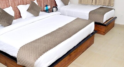 Hotel Siya Room Type - Deluxe Triple Bed AC Room