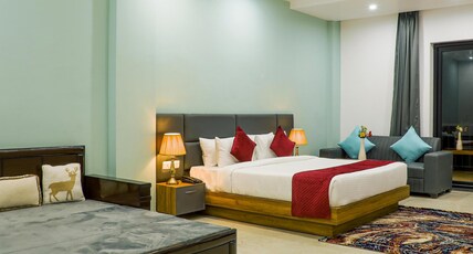 Corbett Tusker Meadows By White Flower (A min Walk to Kosi River) Room Type - Family Suite with Forest and Beautiful Temple View Corbett Tusker Meadows By White Flower (A min Walk to Kosi River) Room Type - Family Suite with Forest and Beautiful Temple View