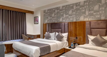 Hotel shrimad Villa Gandhinagar Room Type - Triple Sharing Room
