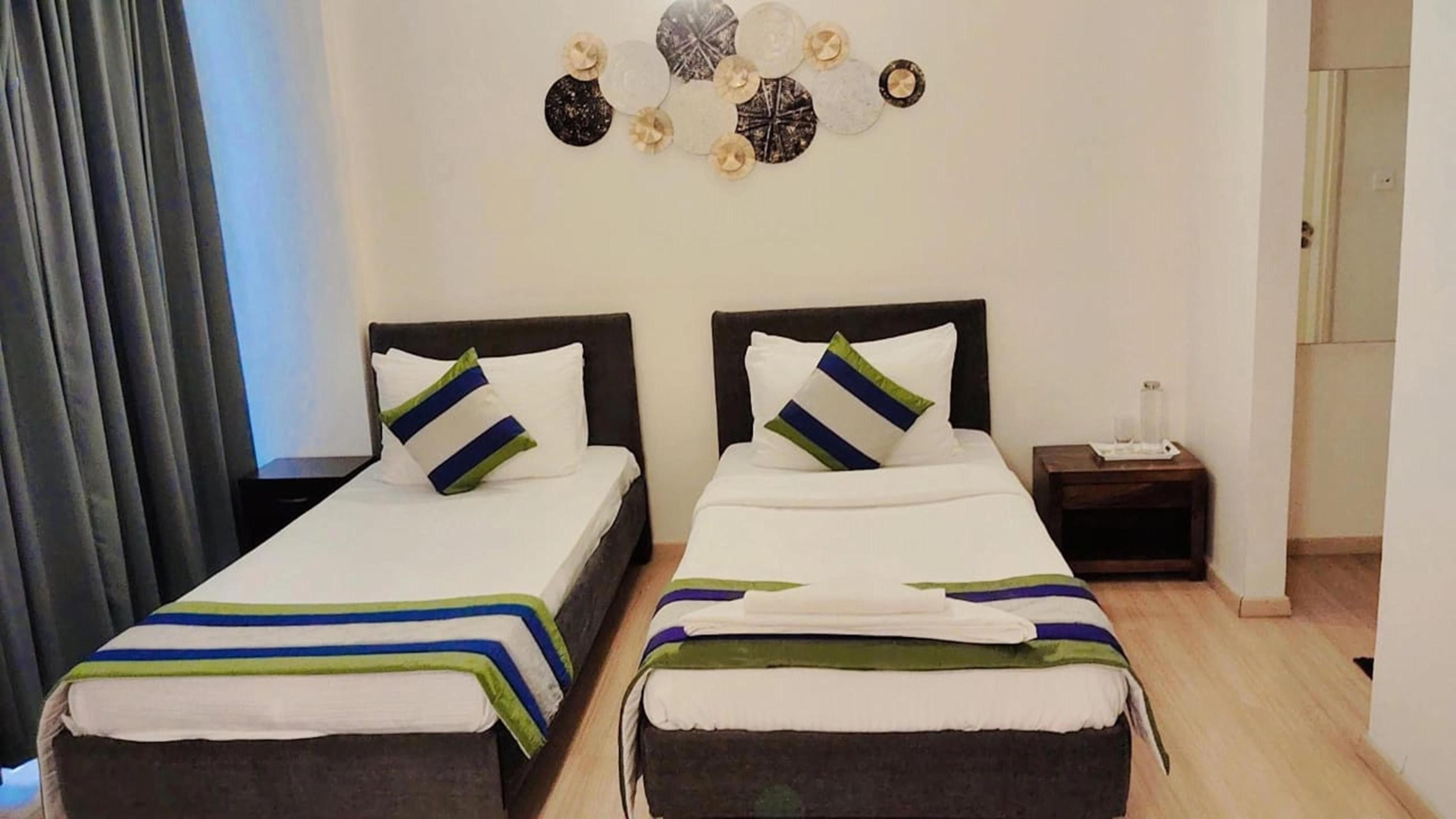 TVS Credit Guest House D-153 - Tap to explore photos