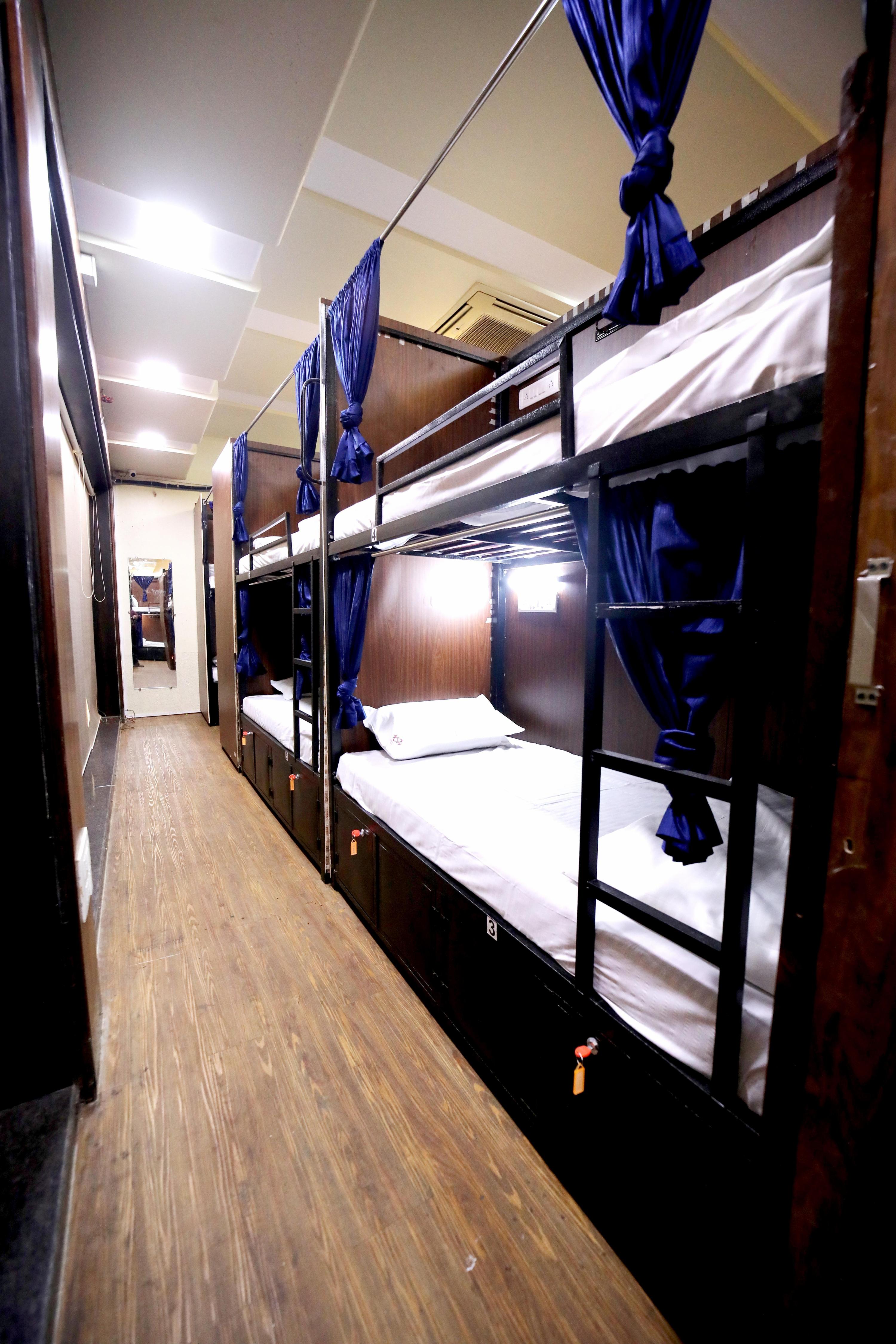 NEST STAYS HOSTEL - Tap to explore photos