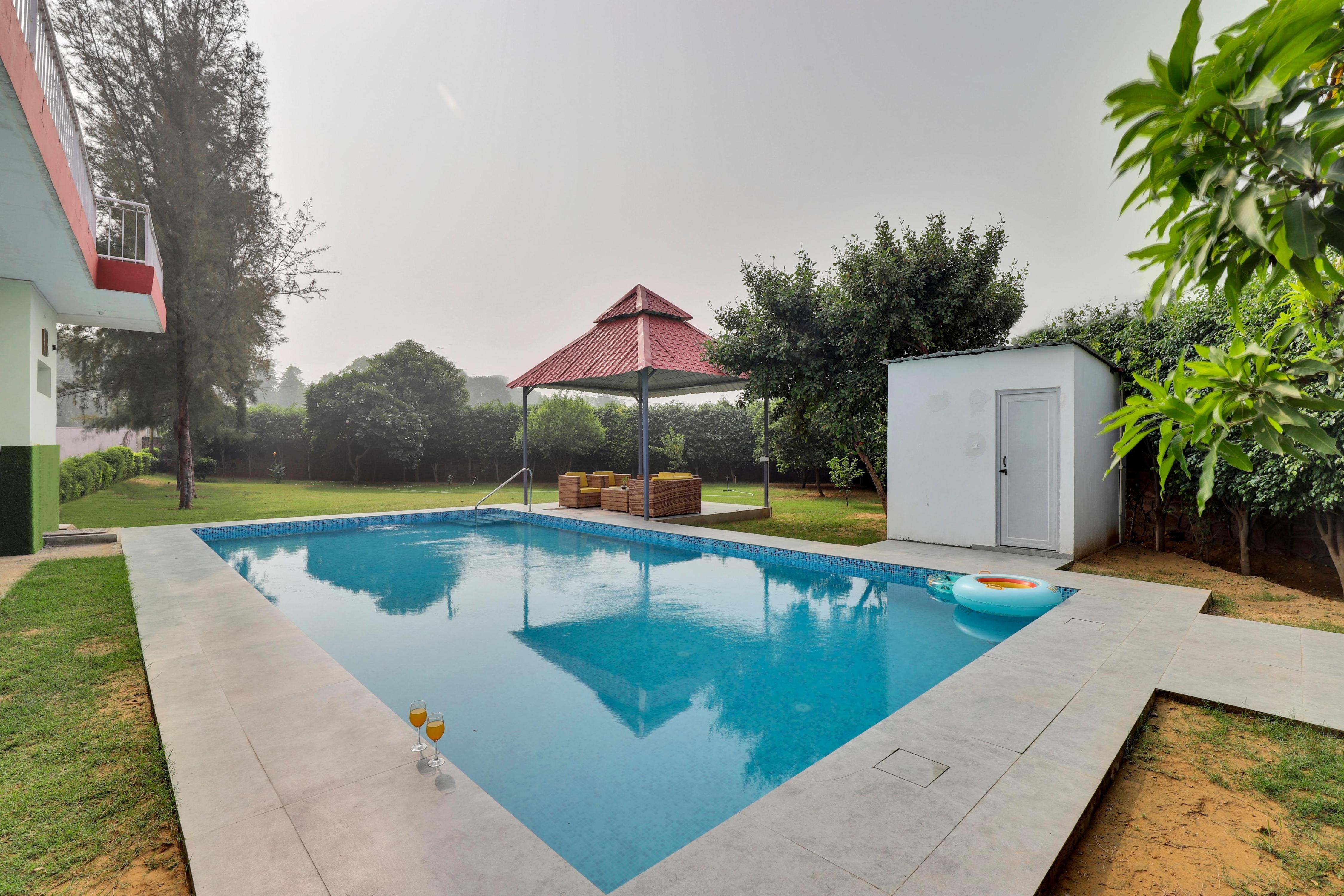 Luxurious 4 BHK farmhouse With Pvt Pool & Garden - Tap to explore photos