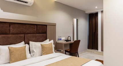 HOTEL METROMAX Room Type - Deluxe AC Room