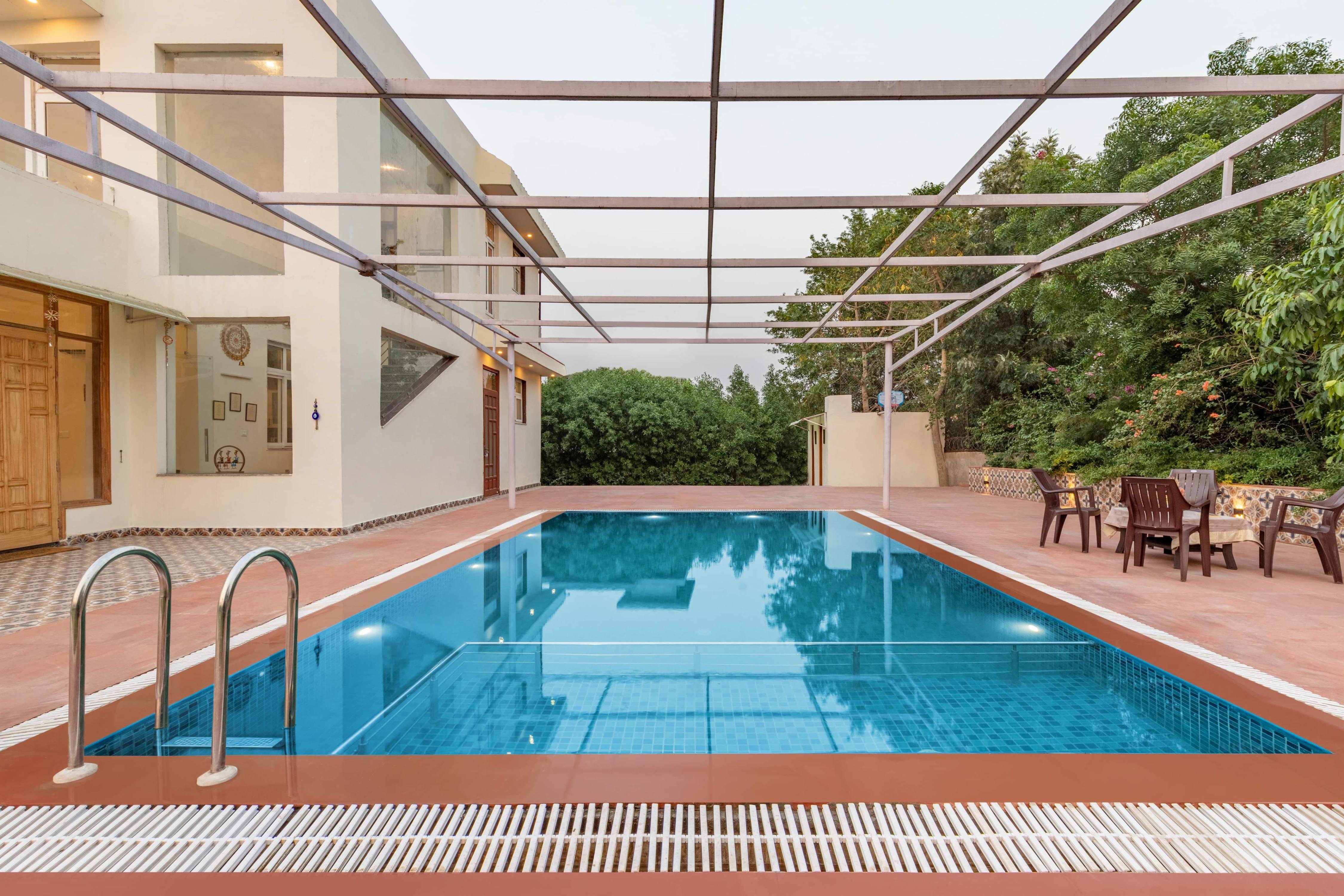 Luxe 2 BHK Farmstay with an entertainment lounge - Tap to explore photos