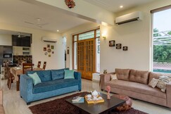 Luxe 2 BHK Farmstay with an entertainment lounge