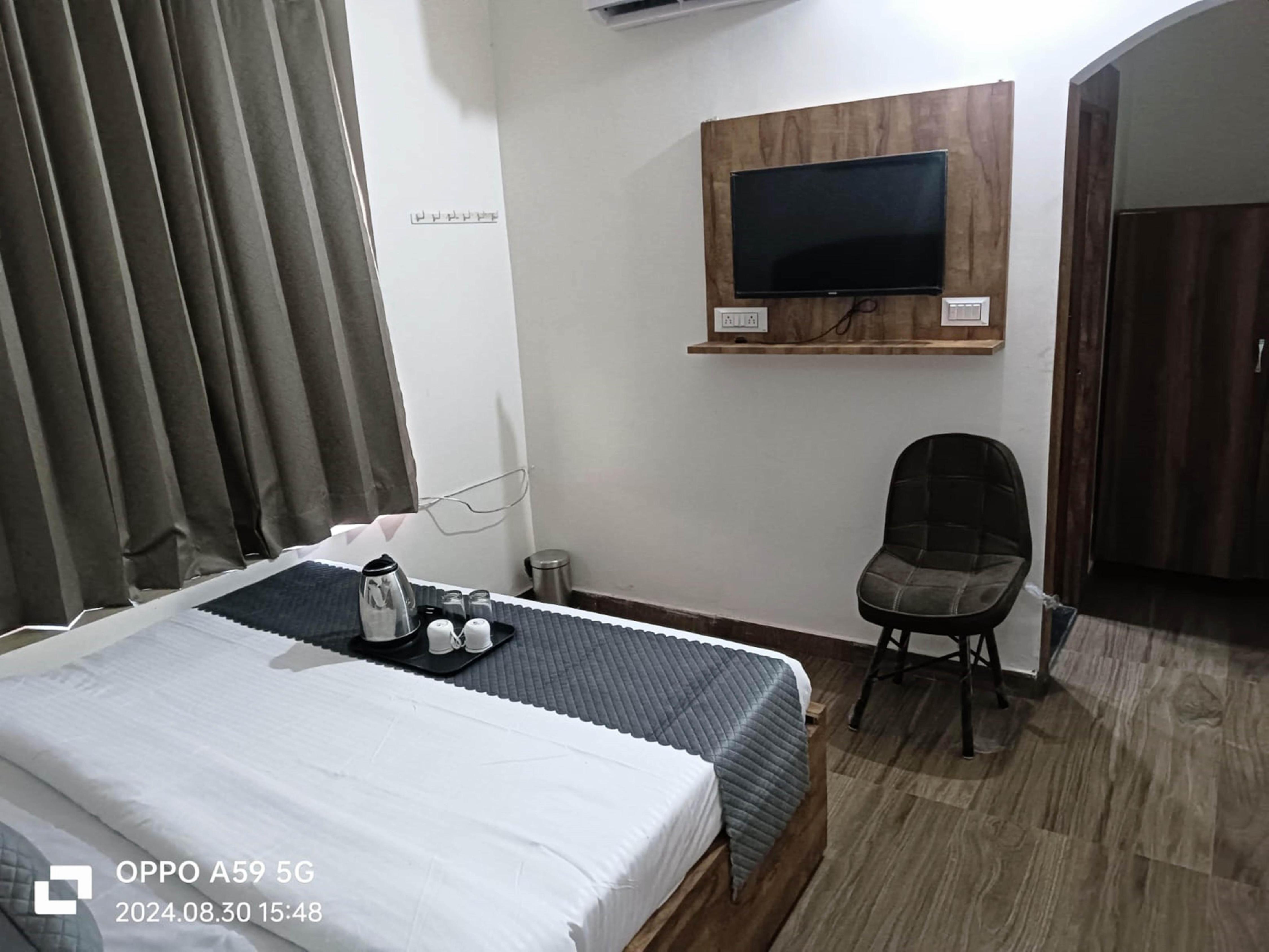 ShriGo Hotel Pushpa Residency - Tap to explore photos