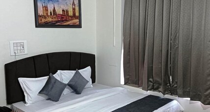 ShriGo Hotel Pushpa Residency Room Type - Deluxe Room