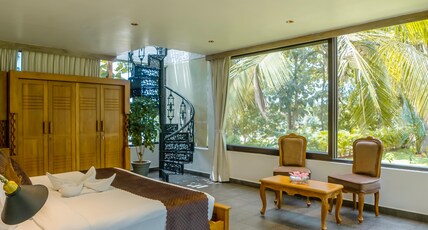 Regenta Resort Mysore Tropical Village Room Type - North American Village with Balcony Regenta Resort Mysore Tropical Village Room Type - North American Village with Balcony