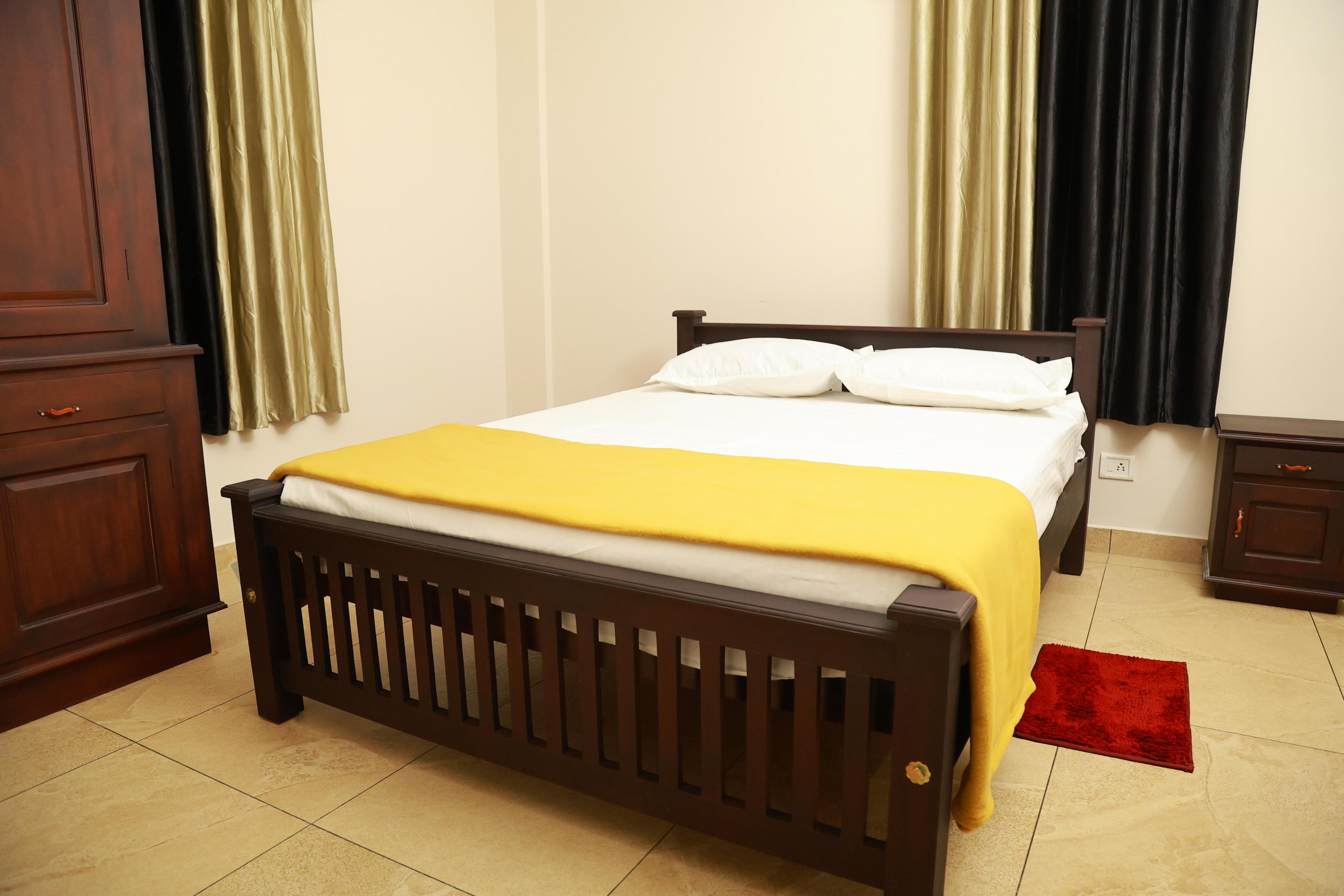 Malabar 2 BHK Service Apartment - Tap to explore photos