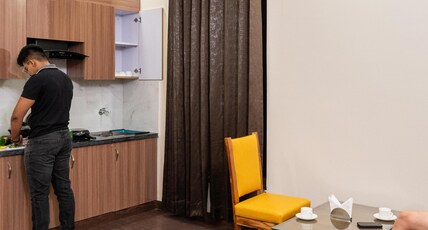 Lime Tree Hotel & One BHK Serviced Apartment N/B Noida Sector 50 Metro & Spectrum Mall Room Type - Deluxe 1 BHK Apartment | Balcony & Kitchenette