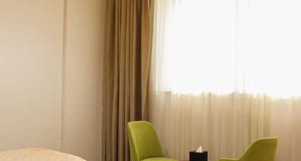 Al Riyadh Hotel apartment Room Type - One-Bedroom Apartment twin Bed