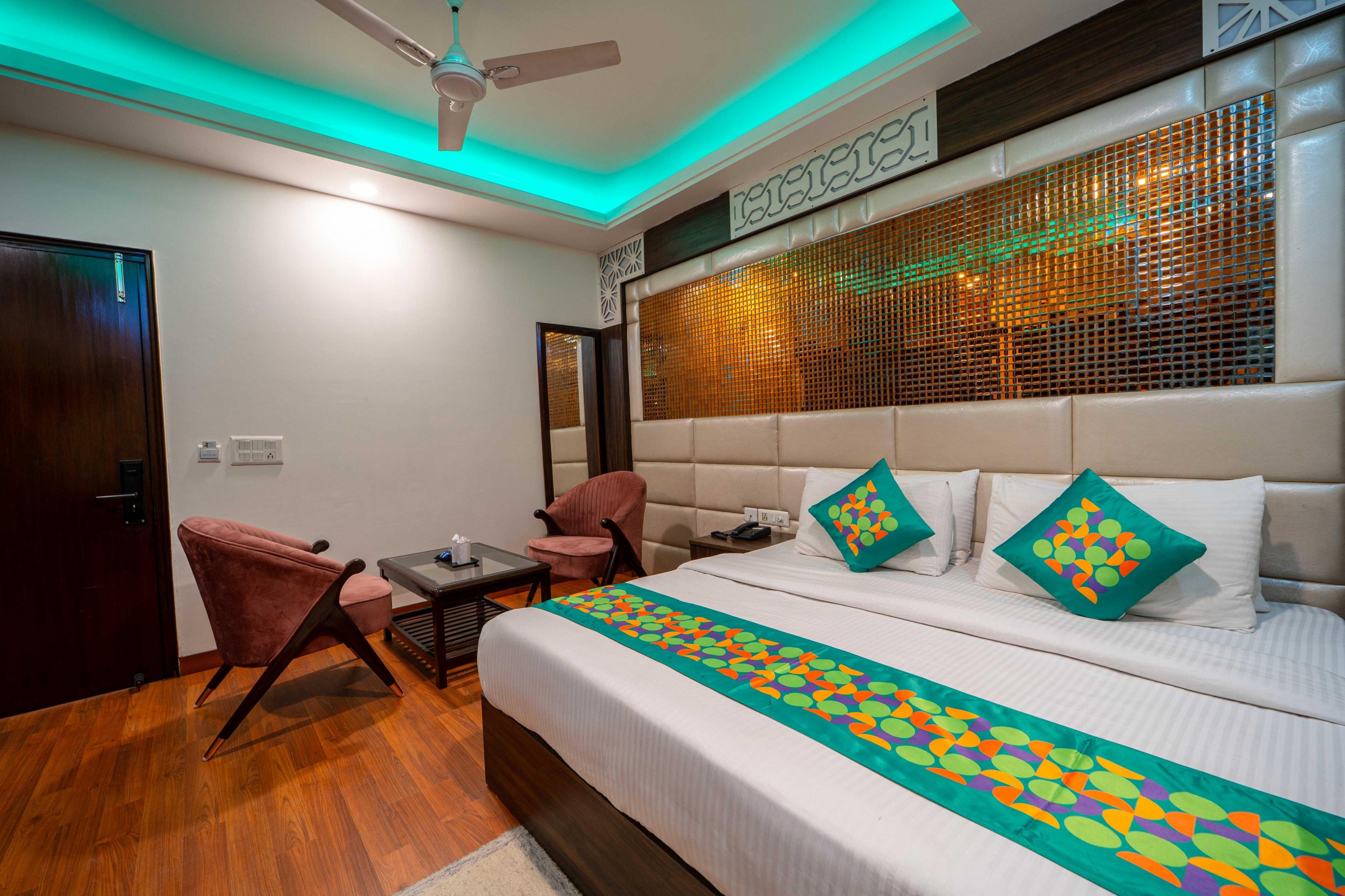 Treebo Marigold - Tap to explore photos