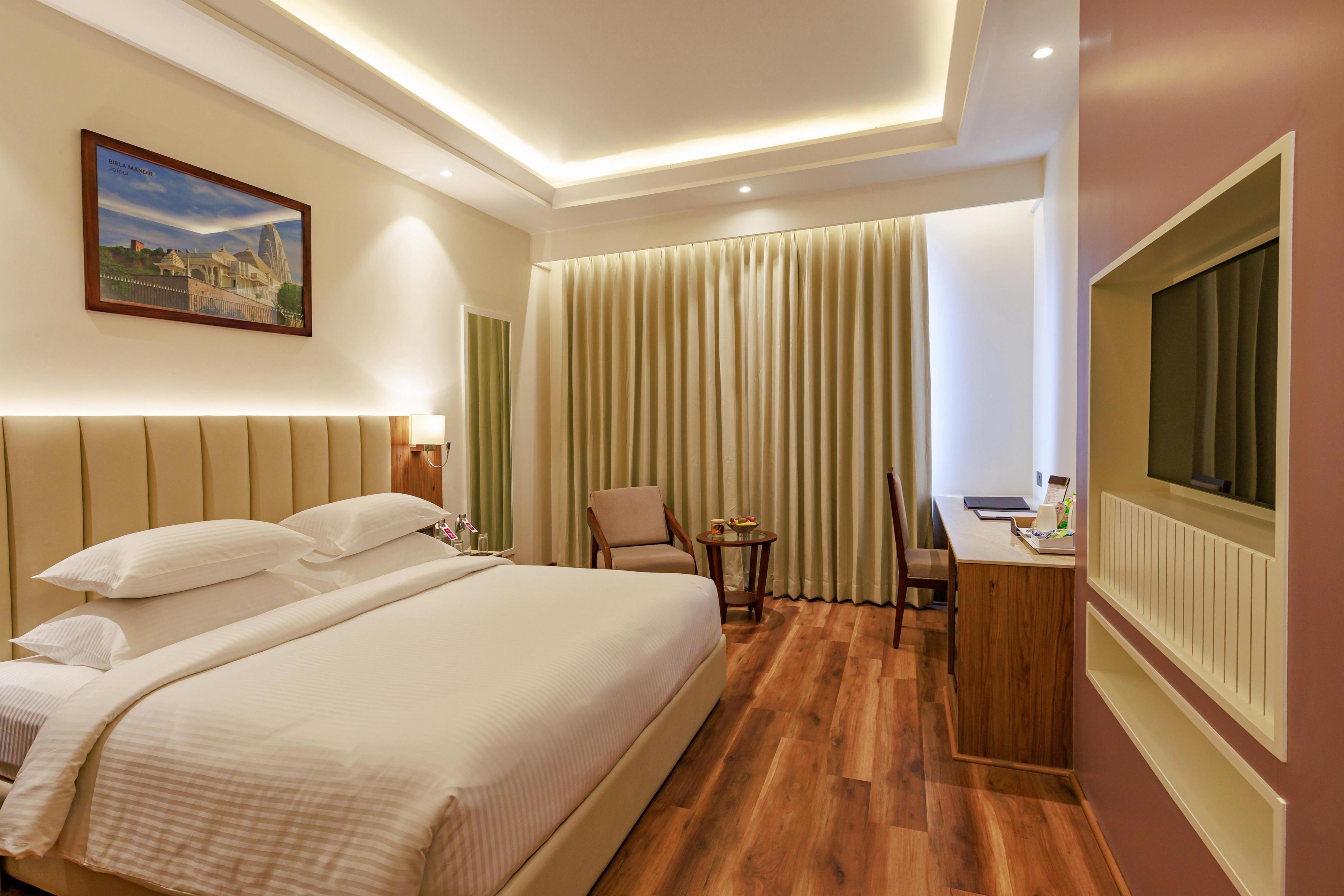Regenta Place Jaipur Room Type - Deluxe Room - Enjoy Happy Hour 1+1 Mocktail timing 11 AM to 7 PM